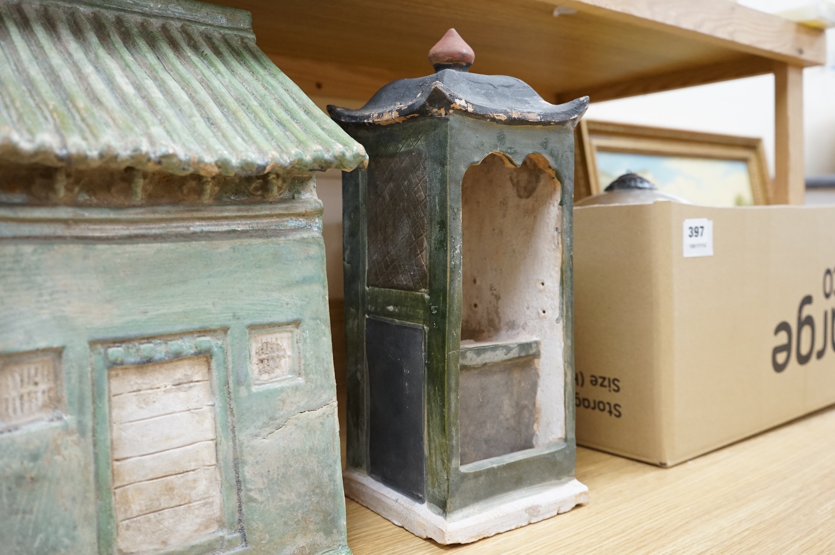A Chinese Ming sancai glazed model of a cupboard and a shrine, 16th century, 40cm high